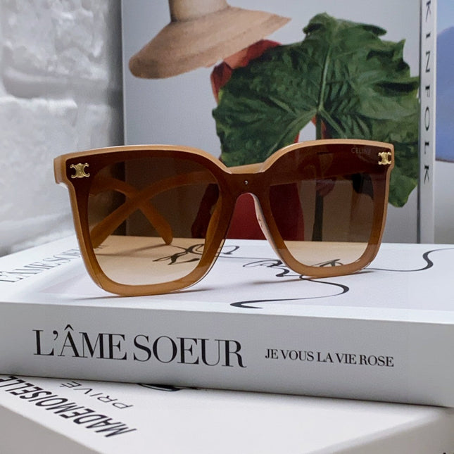 TRIOMPHE SUNGLASSES 552774 IN CARAMEL ACETATE TEXT LOGO