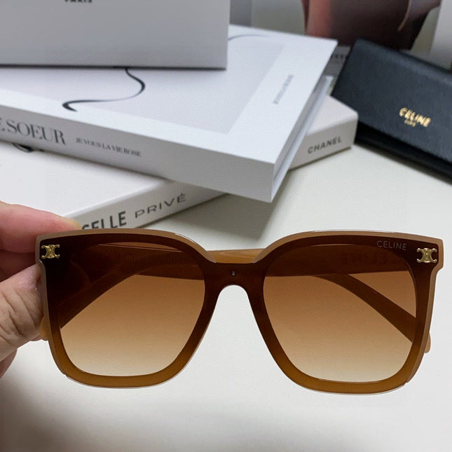 TRIOMPHE SUNGLASSES 552774 IN CARAMEL ACETATE TEXT LOGO
