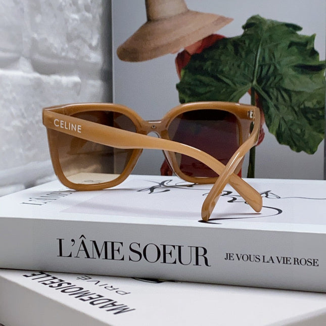 TRIOMPHE SUNGLASSES 552774 IN CARAMEL ACETATE TEXT LOGO