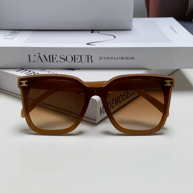 TRIOMPHE SUNGLASSES 552774 IN CARAMEL ACETATE TEXT LOGO