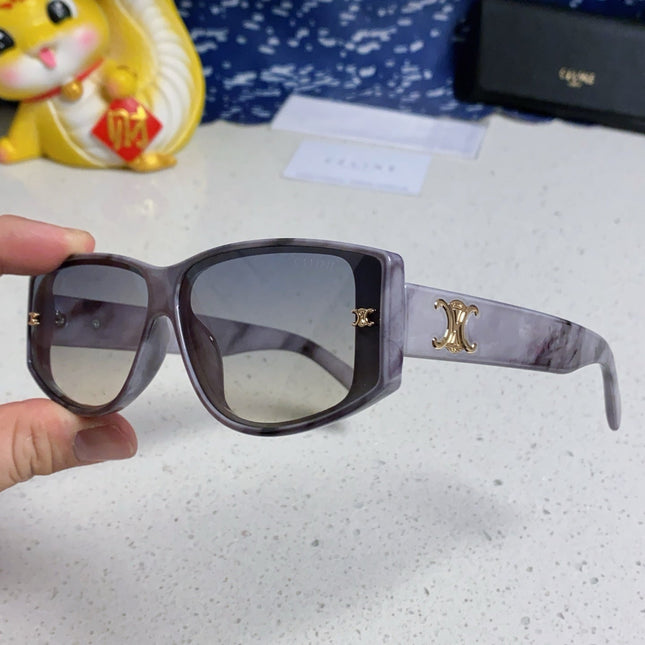 TRIOMPHE SUNGLASS 566217 IN MARBLED EFFECT ACETATE