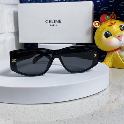 TRIOMPHE SUNGLASS 533220 IN BLACK ACETATE GOLD LOGO