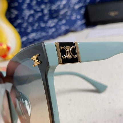 TRIOMPHE SUNGLASSES 548632 IN BABY BLUE ACETATE