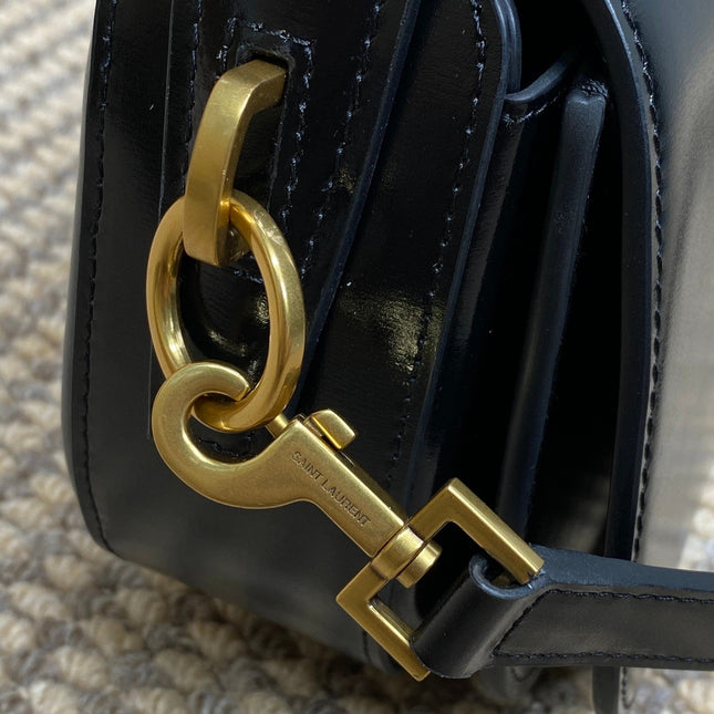VOLTAIRE HALF-MOON SHOULDER BAG 24 IN BLACK CALFSKIN GOLD METALLIC