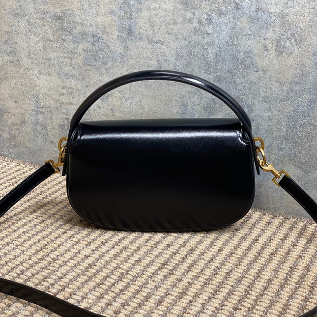 VOLTAIRE HALF-MOON SHOULDER BAG 24 IN BLACK CALFSKIN GOLD METALLIC