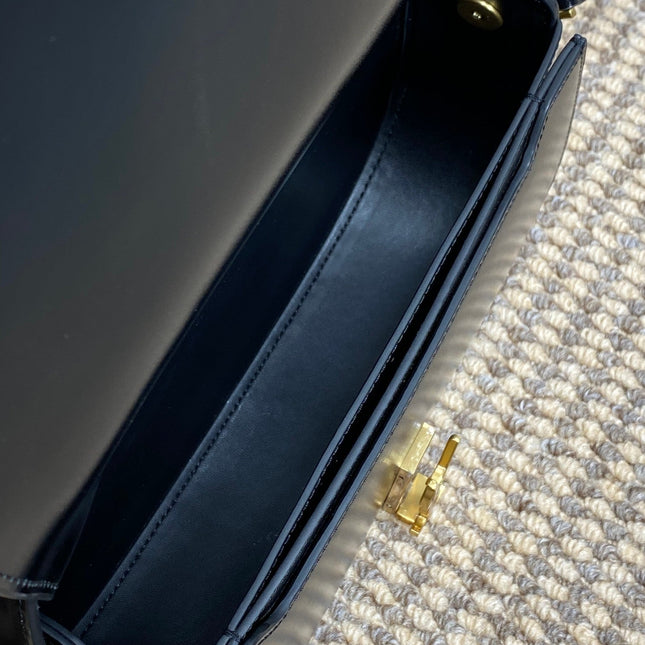 VOLTAIRE HALF-MOON SHOULDER BAG 24 IN BLACK CALFSKIN GOLD METALLIC