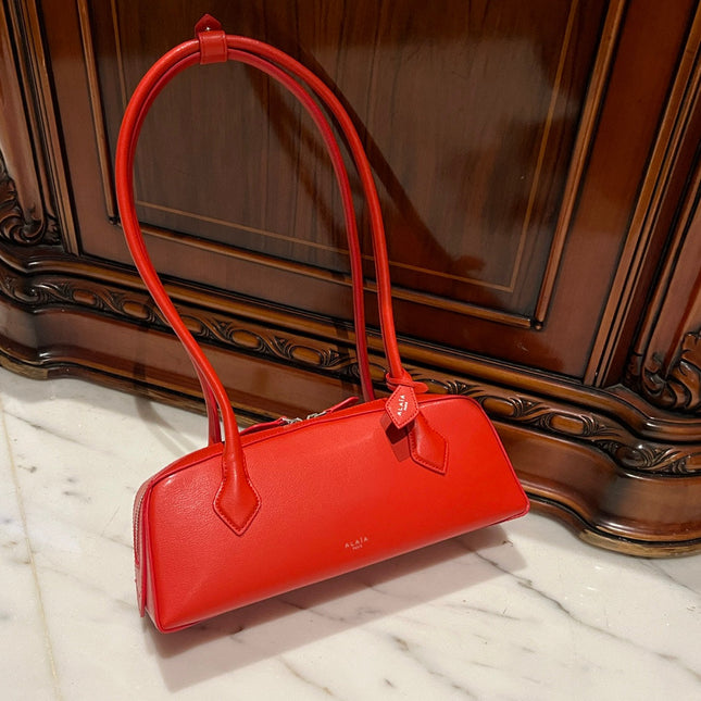 LE TECKEL MEDIUM BAG 33 IN CLASSIC RED GOATSKIN