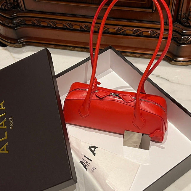 LE TECKEL MEDIUM BAG 33 IN CLASSIC RED GOATSKIN