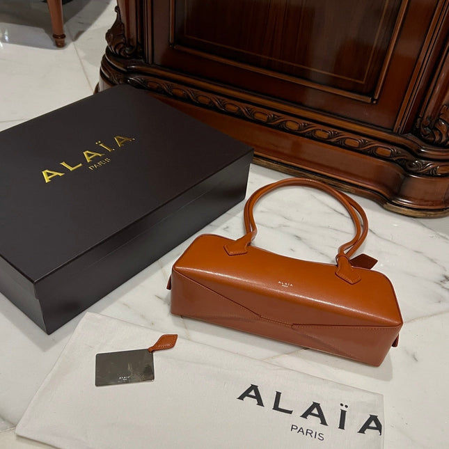 LE TECKEL MEDIUM BAG 33 IN BRONZE ORANGE GOATSKIN