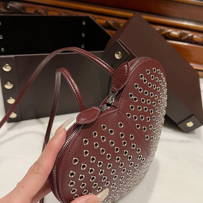 LE COEUR BAG 21 IN BURGUNDY RED STUDDED CALFSKIN