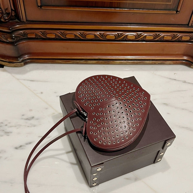 LE COEUR BAG 21 IN BURGUNDY RED STUDDED CALFSKIN