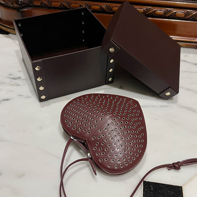 LE COEUR BAG 21 IN BURGUNDY RED STUDDED CALFSKIN