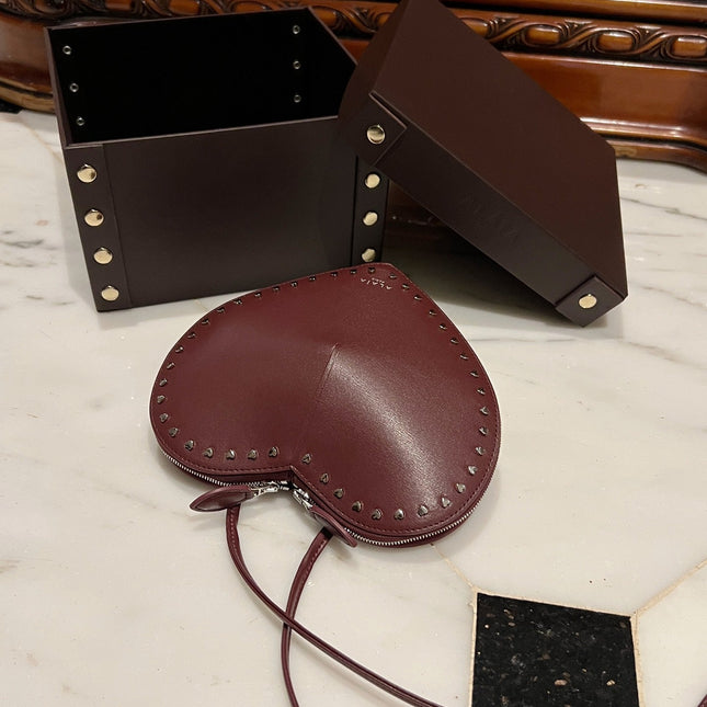LE COEUR BAG 21 IN BURGUNDY RED CALFSKIN WITH STUDDED HEART