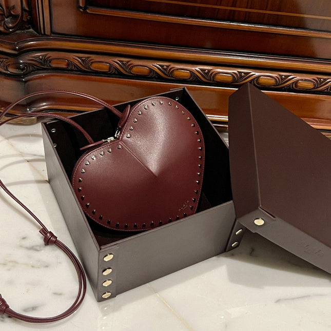 LE COEUR BAG 21 IN BURGUNDY RED CALFSKIN WITH STUDDED HEART