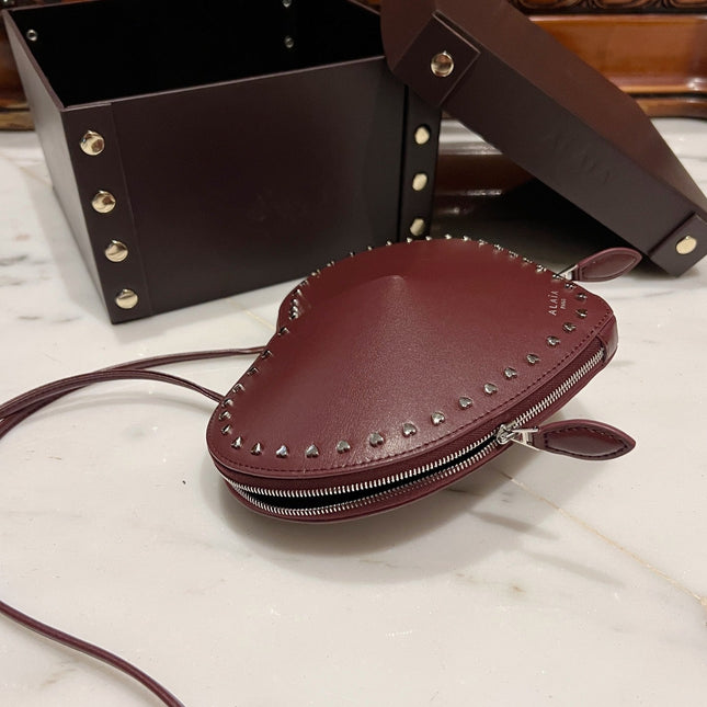 LE COEUR BAG 21 IN BURGUNDY RED CALFSKIN WITH STUDDED HEART
