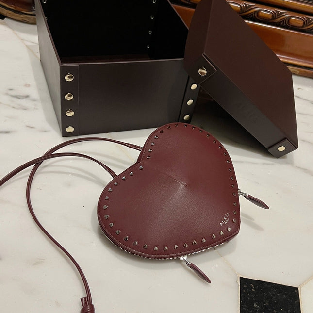LE COEUR BAG 21 IN BURGUNDY RED CALFSKIN WITH STUDDED HEART
