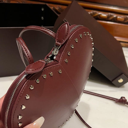 LE COEUR BAG 21 IN BURGUNDY RED CALFSKIN WITH STUDDED HEART