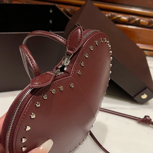 LE COEUR BAG 21 IN BURGUNDY RED CALFSKIN WITH STUDDED HEART