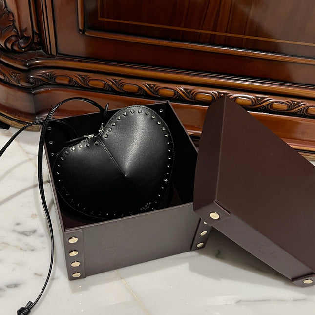 LE COEUR BAG 21 IN BLACK CALFSKIN WITH STUDDED HEART