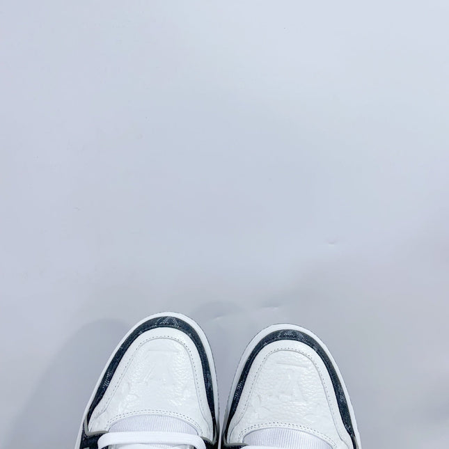 LV TRAINER SNEAKER IN WHITE CALFSKIN AND BLACK MONOGRAM DENIM