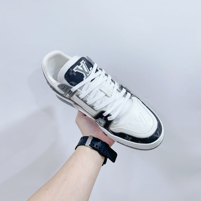 LV TRAINER SNEAKER IN WHITE CALFSKIN AND BLACK MONOGRAM DENIM