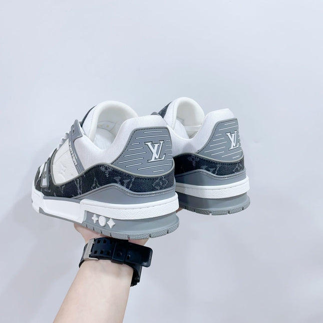 LV TRAINER SNEAKER IN WHITE CALFSKIN AND BLACK MONOGRAM DENIM