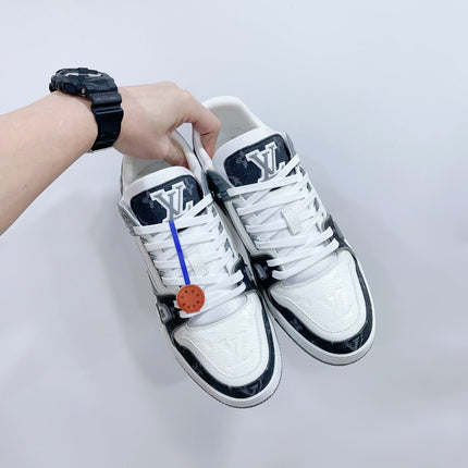 LV TRAINER SNEAKER IN WHITE CALFSKIN AND BLACK MONOGRAM DENIM