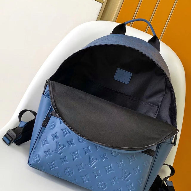 DISCOVERY BACKPACK 38 IN BLUE MONOGRAM ECLIPSE CANVAS AND TAURILLON