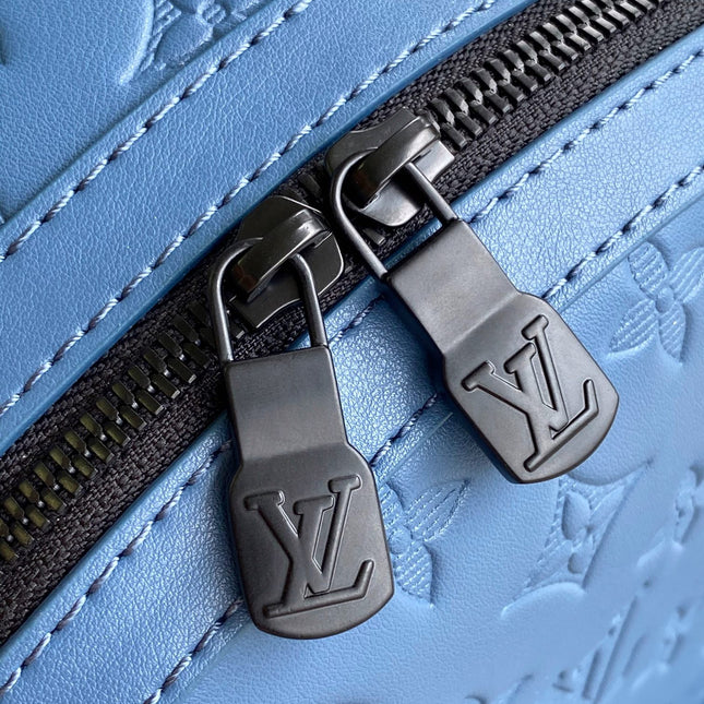 DISCOVERY BACKPACK 38 IN BLUE MONOGRAM ECLIPSE CANVAS AND TAURILLON
