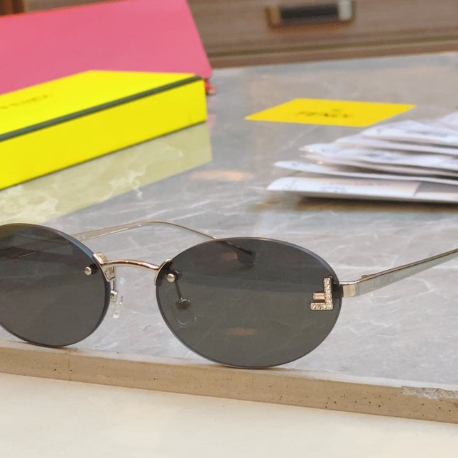 FIRST CRYSTAL OVAL FRAME SUNGLASSES FE4075US IN METAL