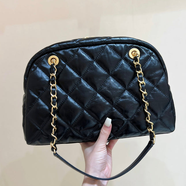 QUILTED BOWLING BAG 33 IN BLACK LAMBSKIN GOLD HARDWARE