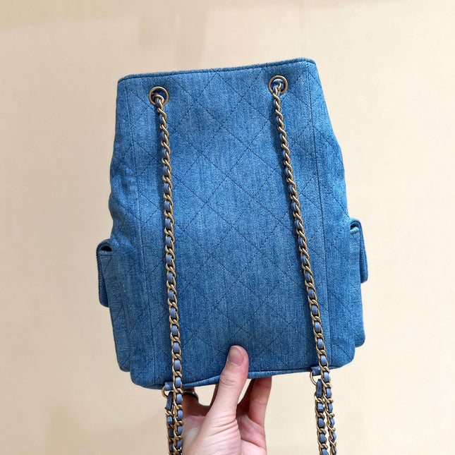 DRAWSTRING BUCKET BACKPACK 24 IN MALIBU BLUE DENIM GOLD HARDWARE