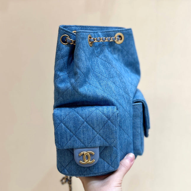 DRAWSTRING BUCKET BACKPACK 24 IN MALIBU BLUE DENIM GOLD HARDWARE