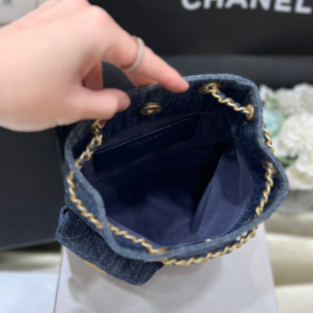 DRAWSTRING BUCKET BACKPACK 24 IN DARK BLUE DENIM GOLD HARDWARE