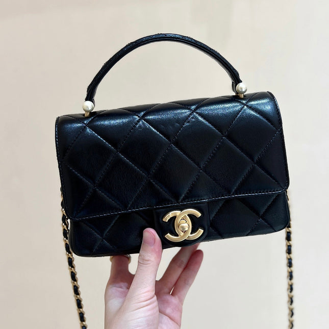 PEARL LIMITED EDITION FLAP BAG WITH HANDLE 20 IN BLACK LAMBSKIN