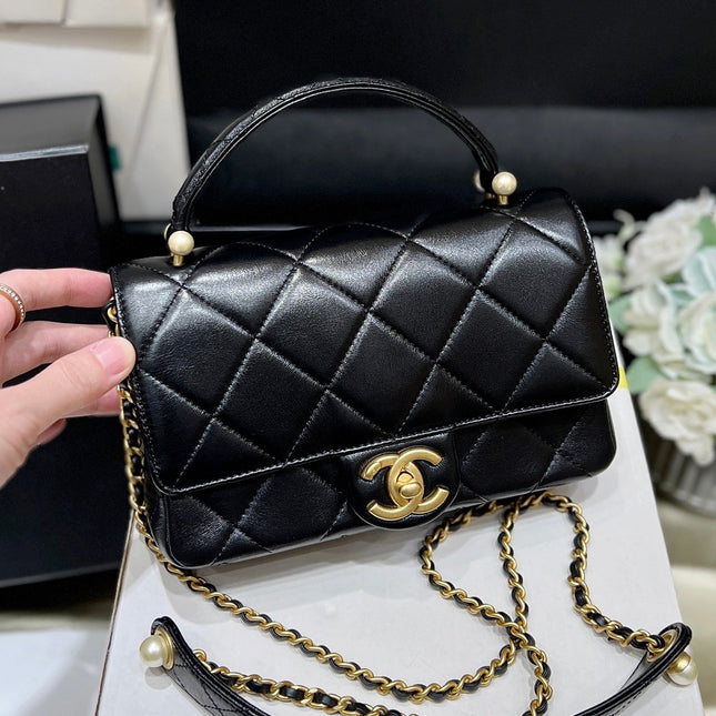 PEARL LIMITED EDITION FLAP BAG WITH HANDLE 20 IN BLACK LAMBSKIN