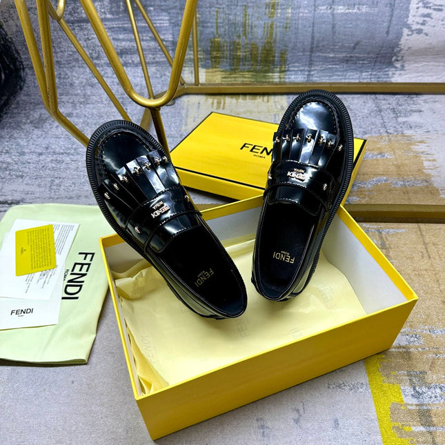 FENDI BAGUETTE LOAFERS IN BLACK CALFSKIN WITH GOLD HARDWARE