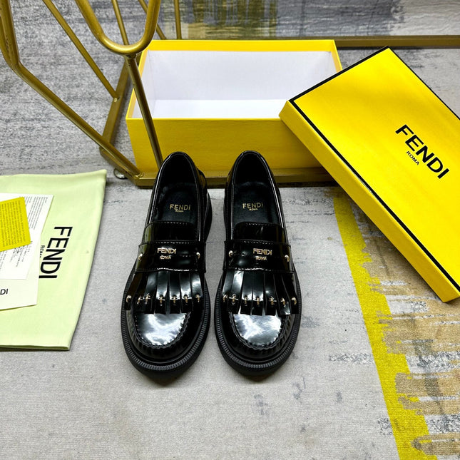 FENDI BAGUETTE LOAFERS IN BLACK CALFSKIN WITH GOLD HARDWARE