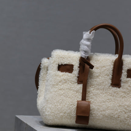 SAC DE JOUR 22 IN WHITE SHEARLING AND BROWN CALFSKIN TRIM