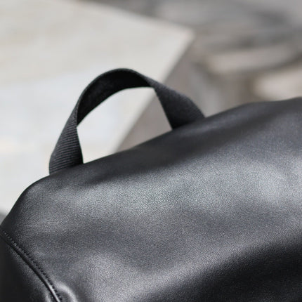 BACKPACK 45 IN BLACK CALFSKIN WITH EMBOSSED LOGO