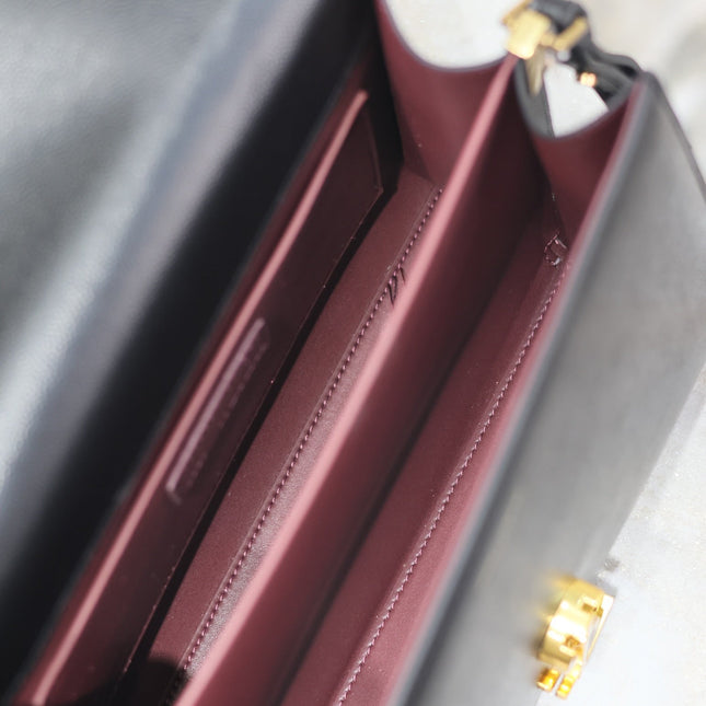 CASSANDRA TOP HANDLE BAG 24 IN BLACK CALFSKIN GOLD HARDWARE