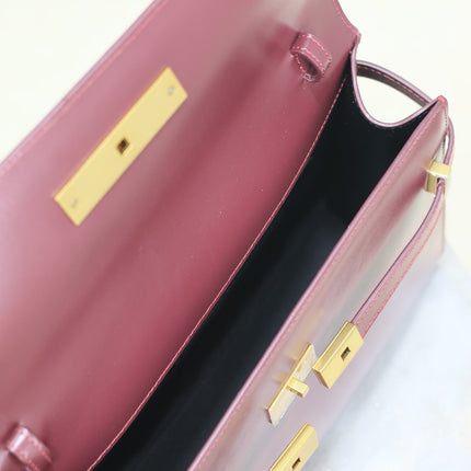 MANHATTAN MEDIUM 29 IN WINE RED SMOOTH CALFSKIN GOLD BUCKLE