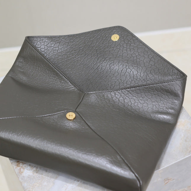 ENVELOPE CLUTCH 29 IN KOMBU GREEN LAMBSKIN COPPER LOGO