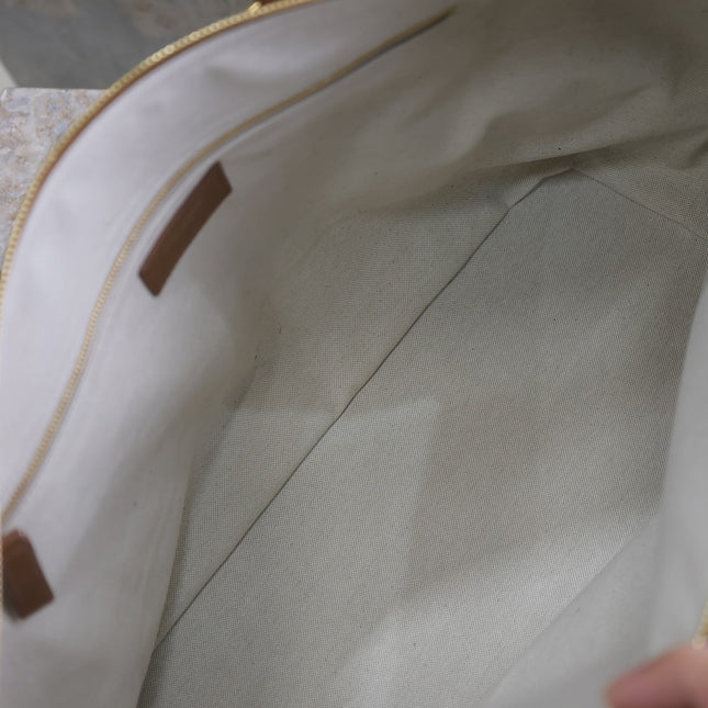 TRAVEL BAG 48 IN WHITE CANVAS AND BROWN LEATHER TRIM GOLD HARDWARE