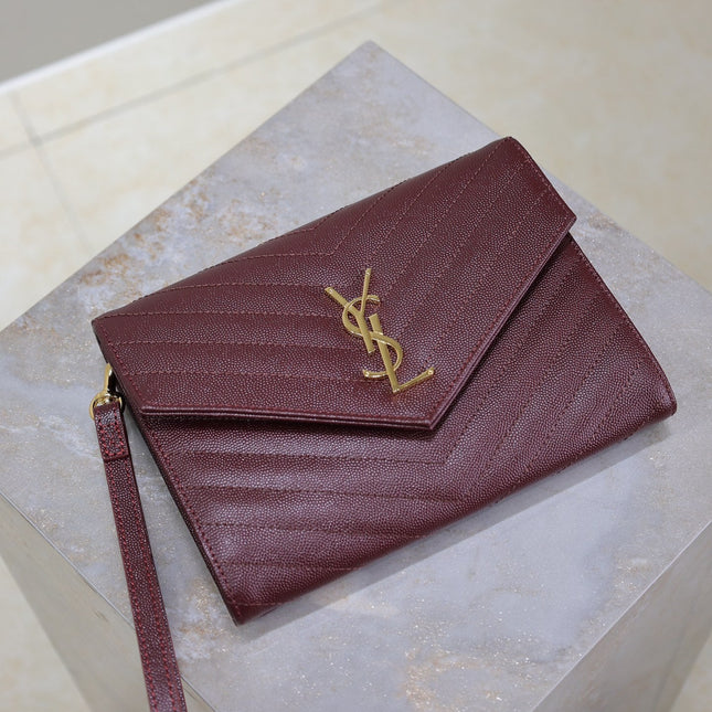 CASSANDRE CLUTCH 21 IN BORDEAUX RED LAMBSKIN GOLD HARDWARE