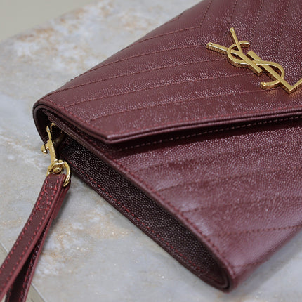 CASSANDRE CLUTCH 21 IN BORDEAUX RED LAMBSKIN GOLD HARDWARE