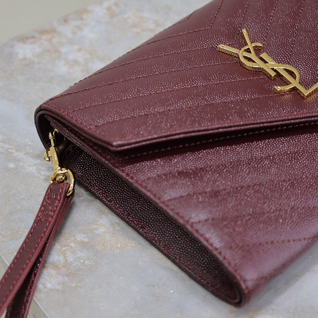 CASSANDRE CLUTCH 21 IN BORDEAUX RED LAMBSKIN GOLD HARDWARE