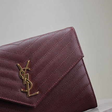 CASSANDRE CLUTCH 21 IN BORDEAUX RED LAMBSKIN GOLD HARDWARE