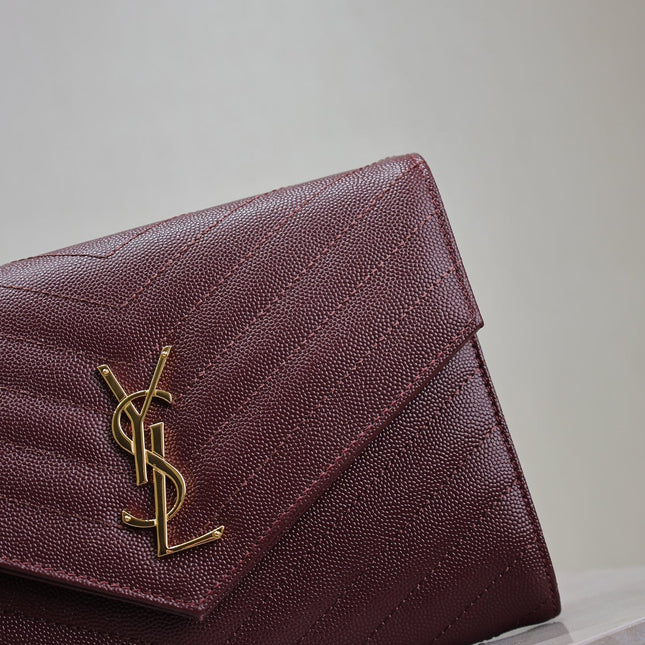 CASSANDRE CLUTCH 21 IN BORDEAUX RED LAMBSKIN GOLD HARDWARE