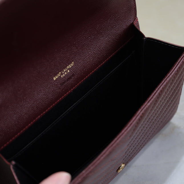 CASSANDRE CLUTCH 21 IN BORDEAUX RED LAMBSKIN GOLD HARDWARE